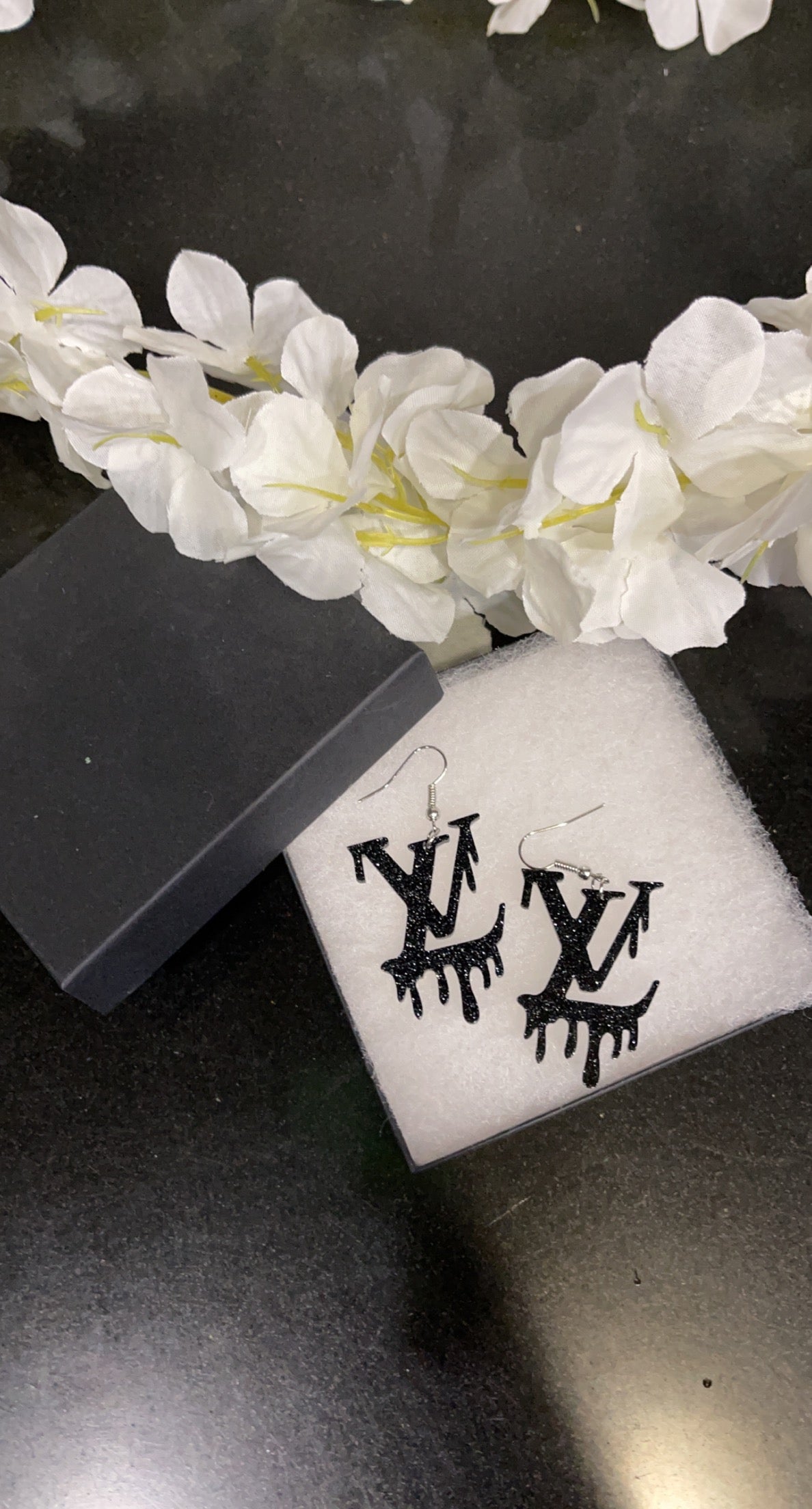 L v earrings